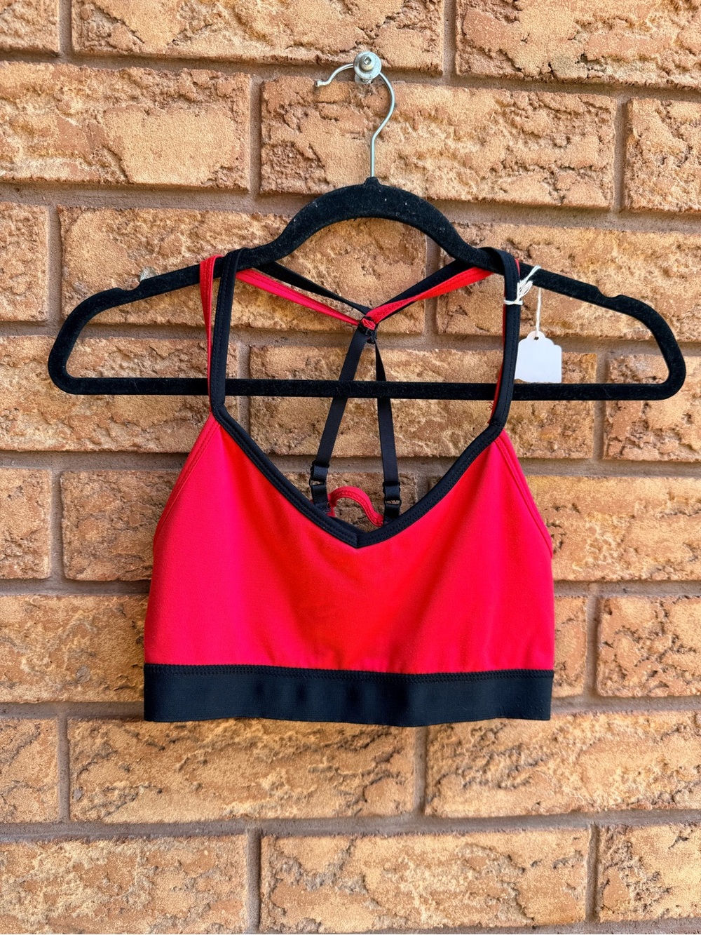 💫10/$25 • Danskin Active Flamenco Red with Black Trim Strappy Bra‎
